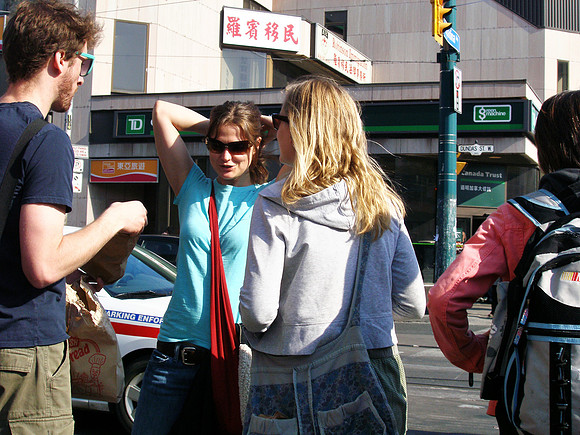 Chatting and Waiting to Cross Dundas at Spadina